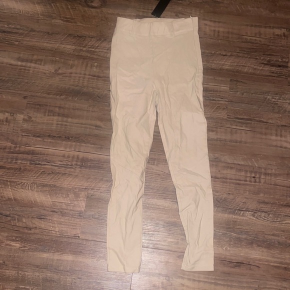 Cream stretchy work pants. Size medium. Never worn. - Picture 1 of 1
